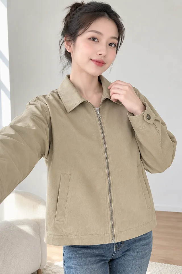 A creator wears the beige zip jacket and shows the fit.