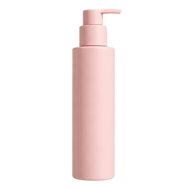 A blank blush-pink pump bottle centered on a white background.