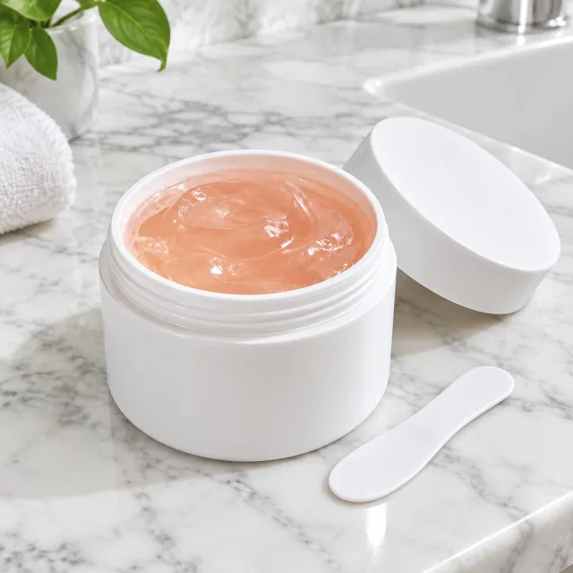 On Sunday night she scoops a spoonful of clear jelly mask, spreads it on and lets it set before peeling it off.