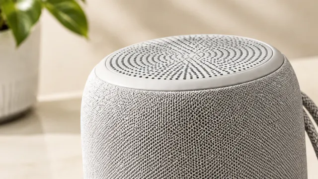Close view of the wireless speaker fabric grille