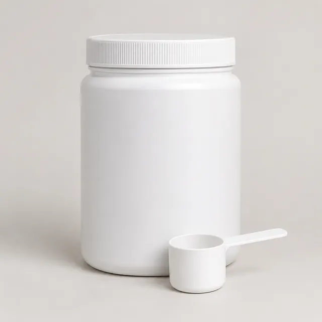 White plastic protein powder tub with a plain front and a scoop on a light studio background