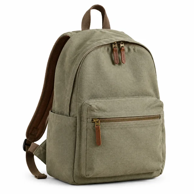 Olive canvas backpack with brown leather details on a pure white background