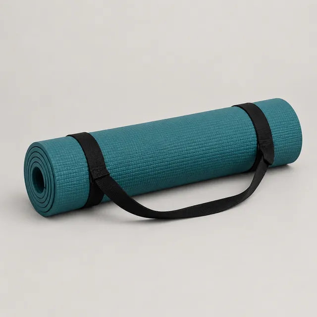 Teal yoga mat rolled up with a black carrying strap on a light studio background