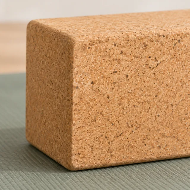 Close-up of the same cork yoga block's grain and edge.