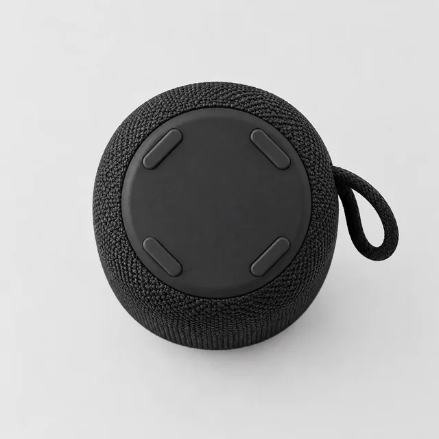 Underside of the portable speaker showing its rubber feet.