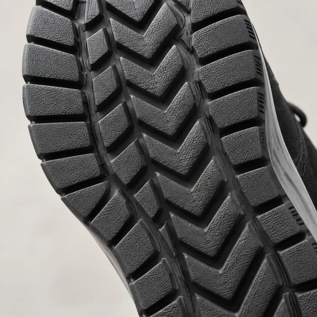 Macro view of a rubber sole tread pattern.