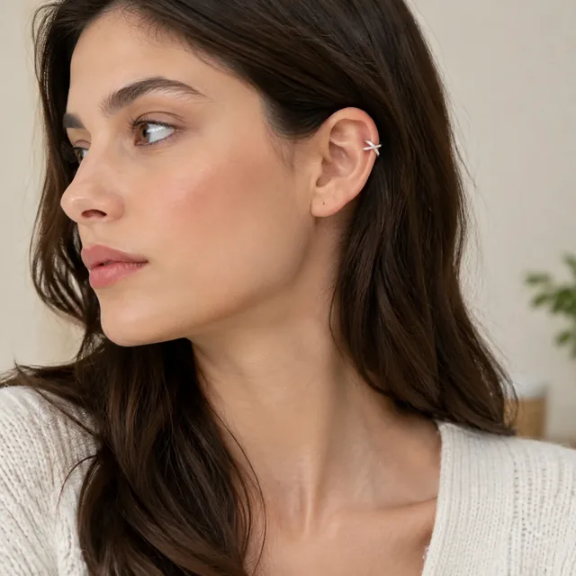 Ear cuff worn high on the ear.