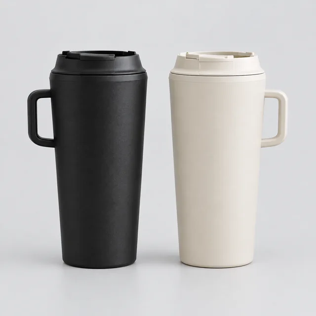 Matte black and cream insulated tumblers shown side by side on a clean surface.