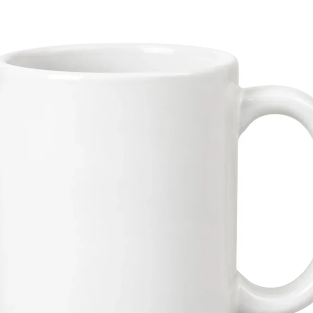 Close crop of the plain white ceramic mug rim and opening, with part of its handle at the edge.
