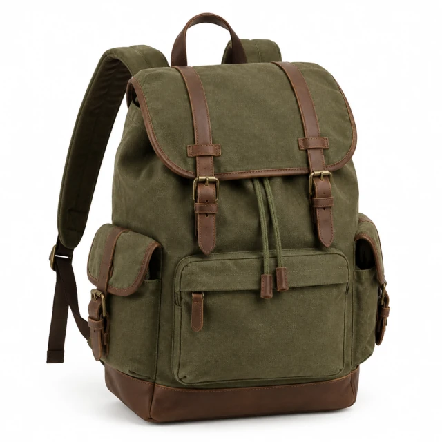 Olive canvas backpack with brown leather details on a pure white background