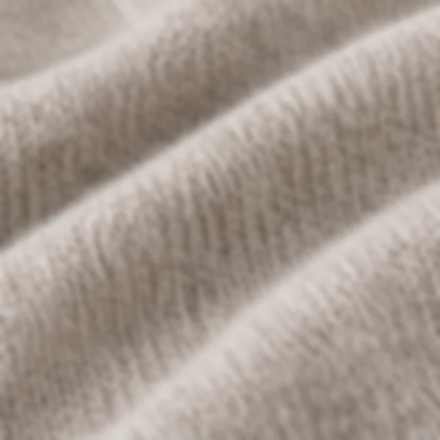 Sweater knit softened until the fibers and rows lose definition.