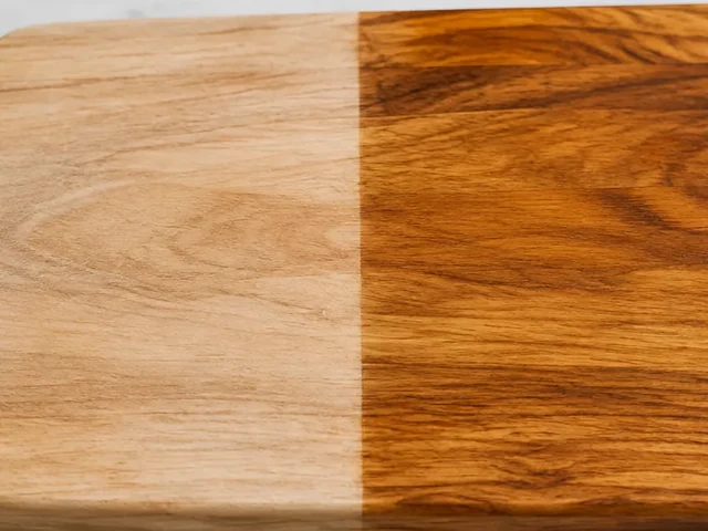 Cutting board enlarged until its handle and outer edges are clipped by the frame.