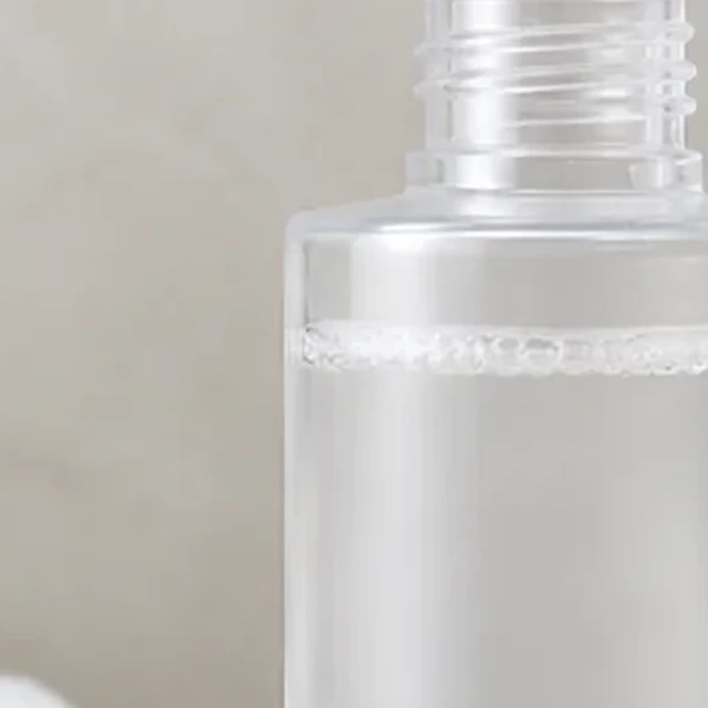 Toner bottle lower half cut off by a tight crop.