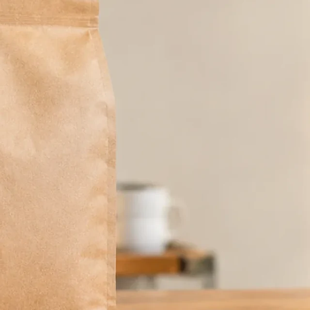 Coffee pouch enlarged until its top and side edge are cut off.