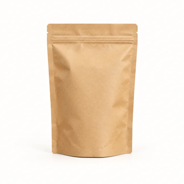 Plain kraft coffee pouch standing alone on a light neutral background.