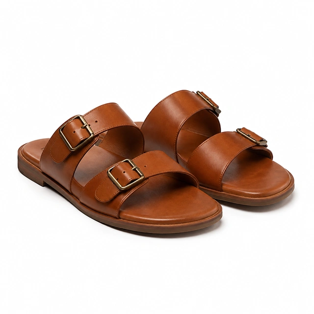 Pair of cognac leather sandals with both straps visible on seamless white.