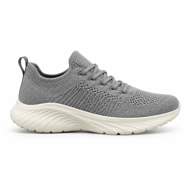 Gray mesh running shoe with a cream sole in side profile on white.