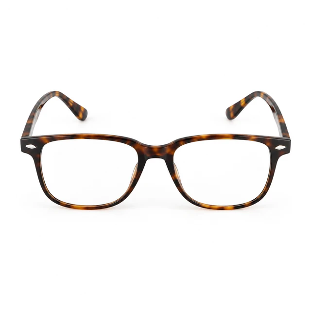Tortoiseshell reading glasses opened and centered on white.