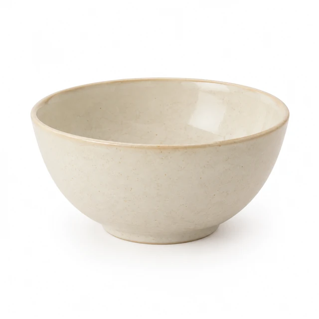 Cream stoneware serving bowl with a softly rounded rim on white.