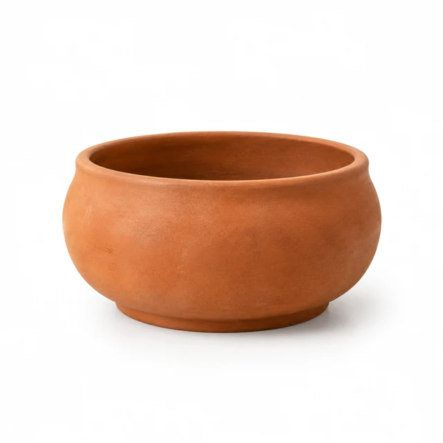 Wide terracotta ceramic planter with a simple open rim on white.