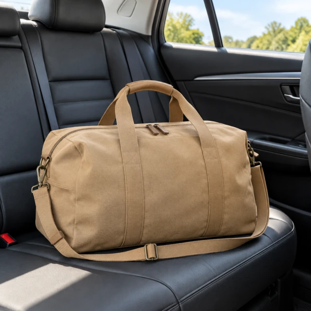 Canvas weekender bag on a car seat
